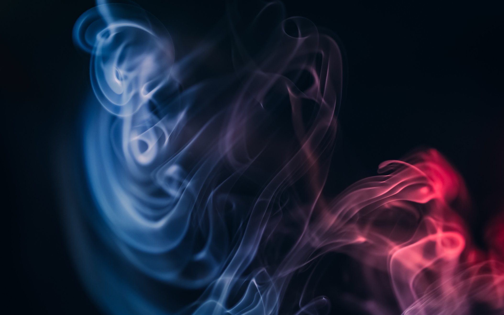 Blue and Red Smoke in Close Up Shot